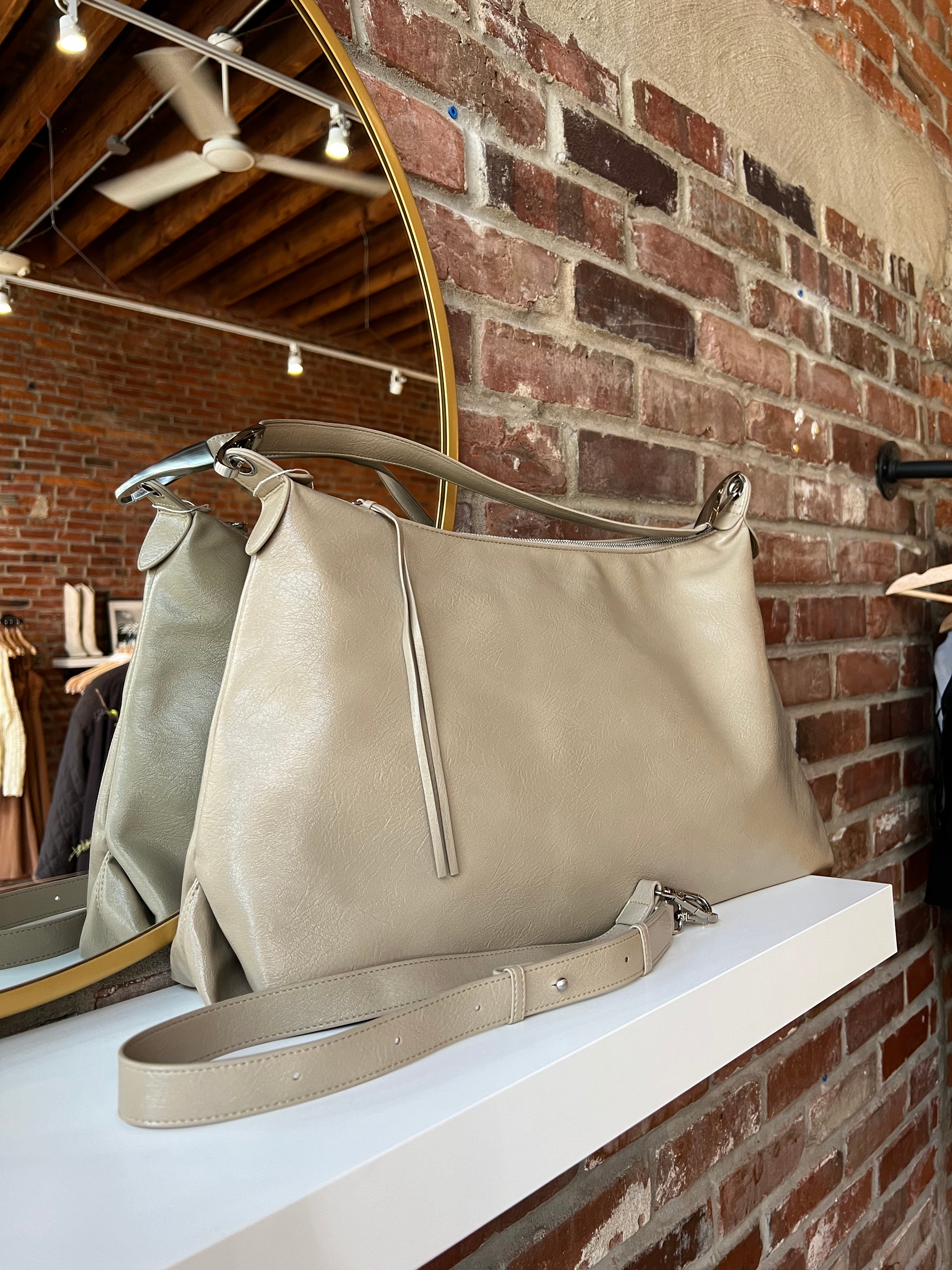 Palmer Beige Leather Shoulder Bag with short shoulder strap and adjustable long crossbody strap