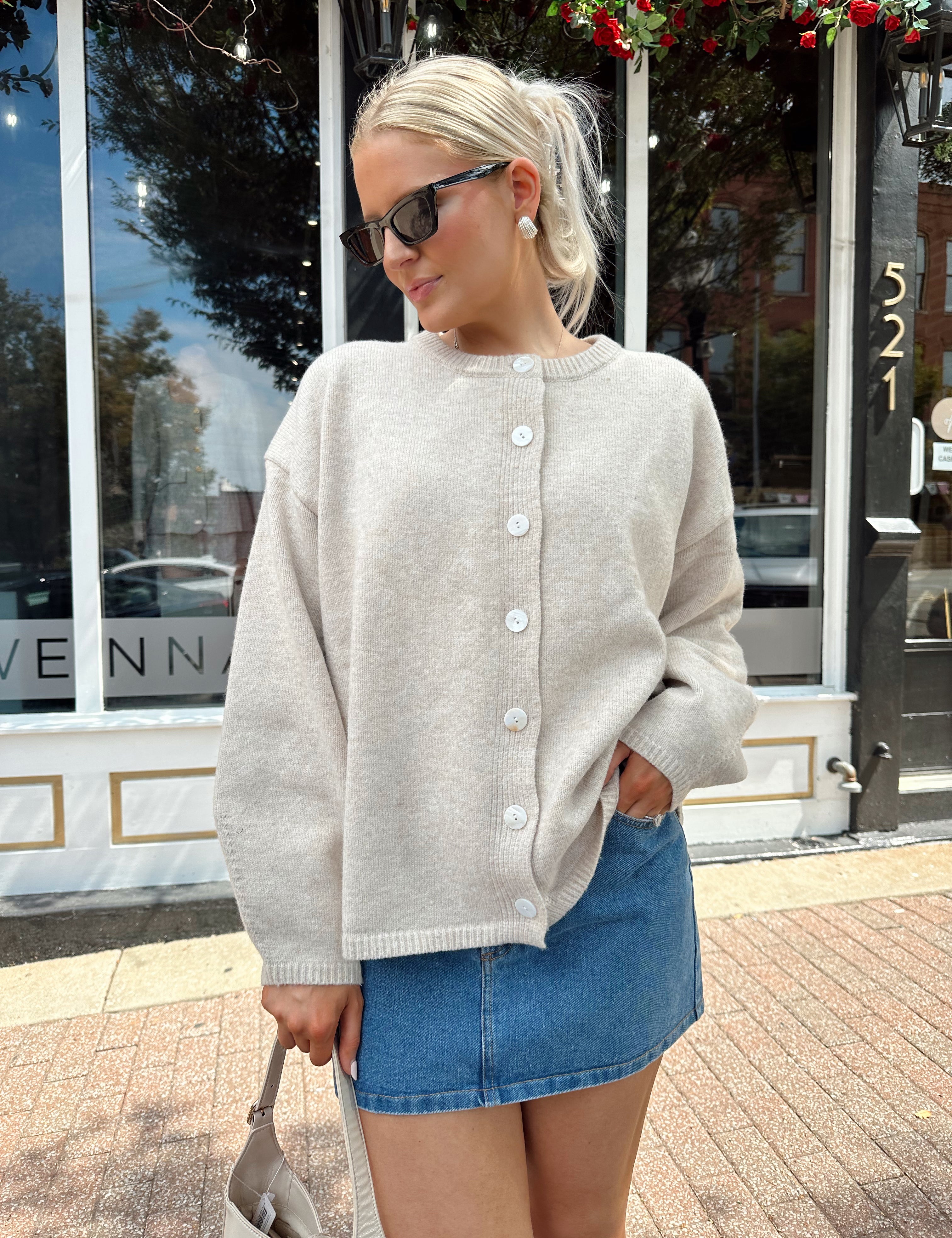 Oatmeal colored balloon sleeve button down cardigan. 