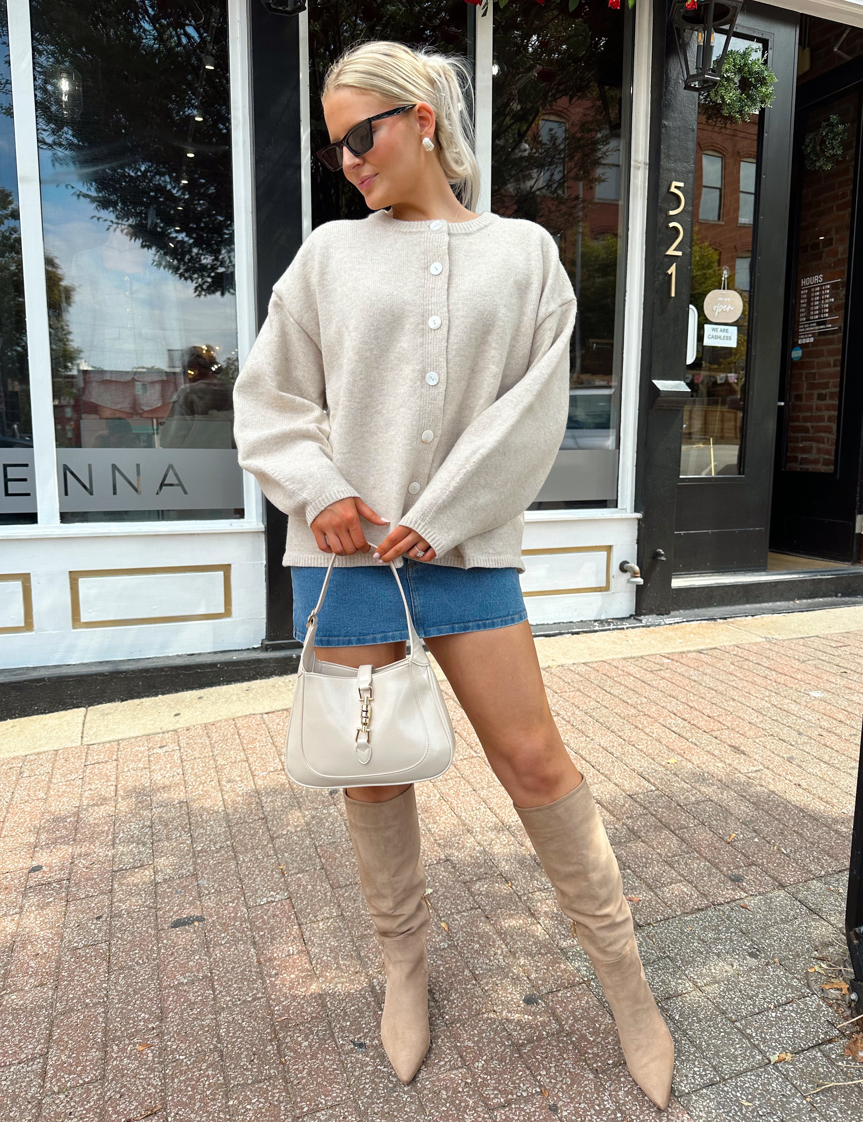 Oatmeal colored balloon sleeve button down cardigan. 