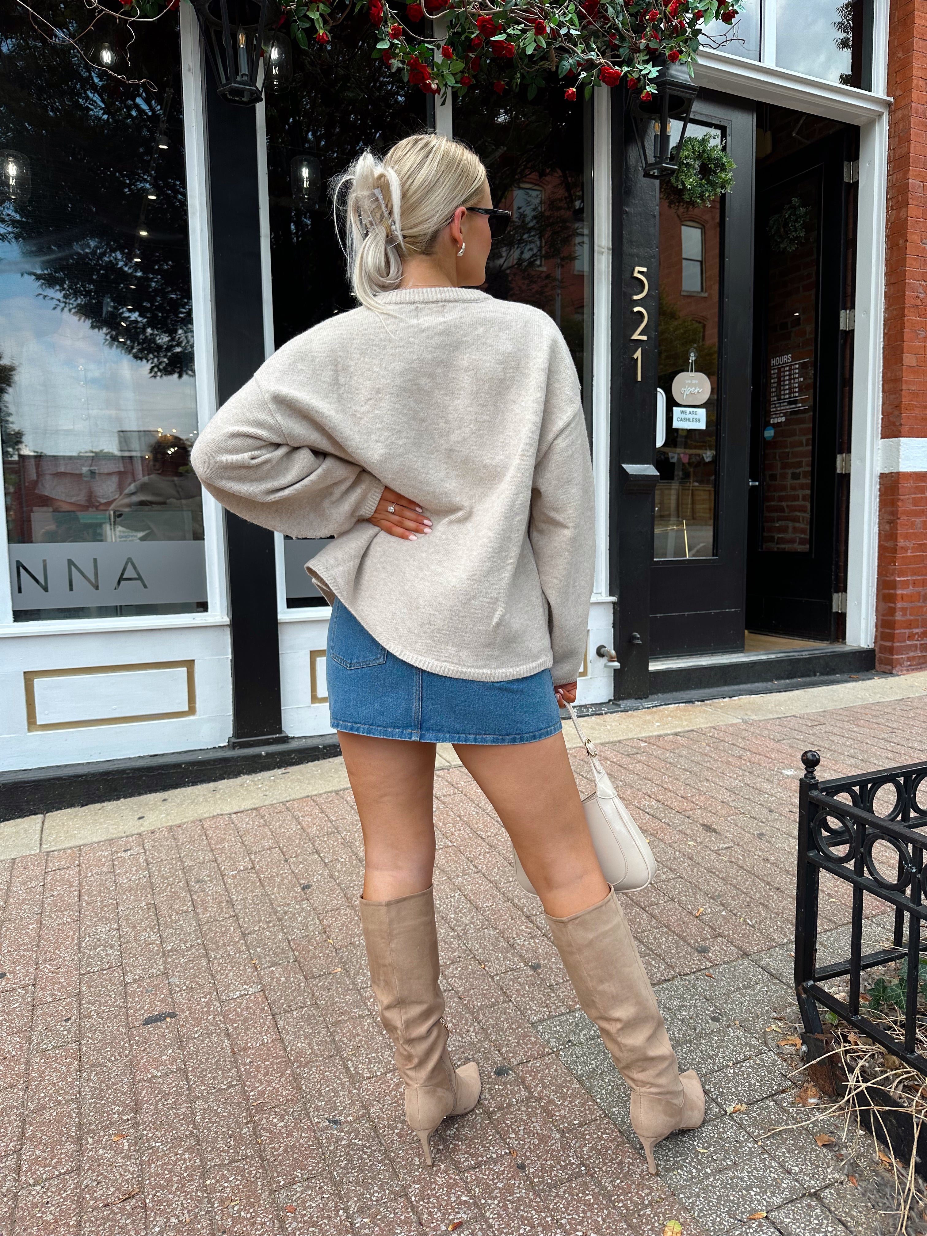 Oatmeal colored balloon sleeve button down cardigan. 