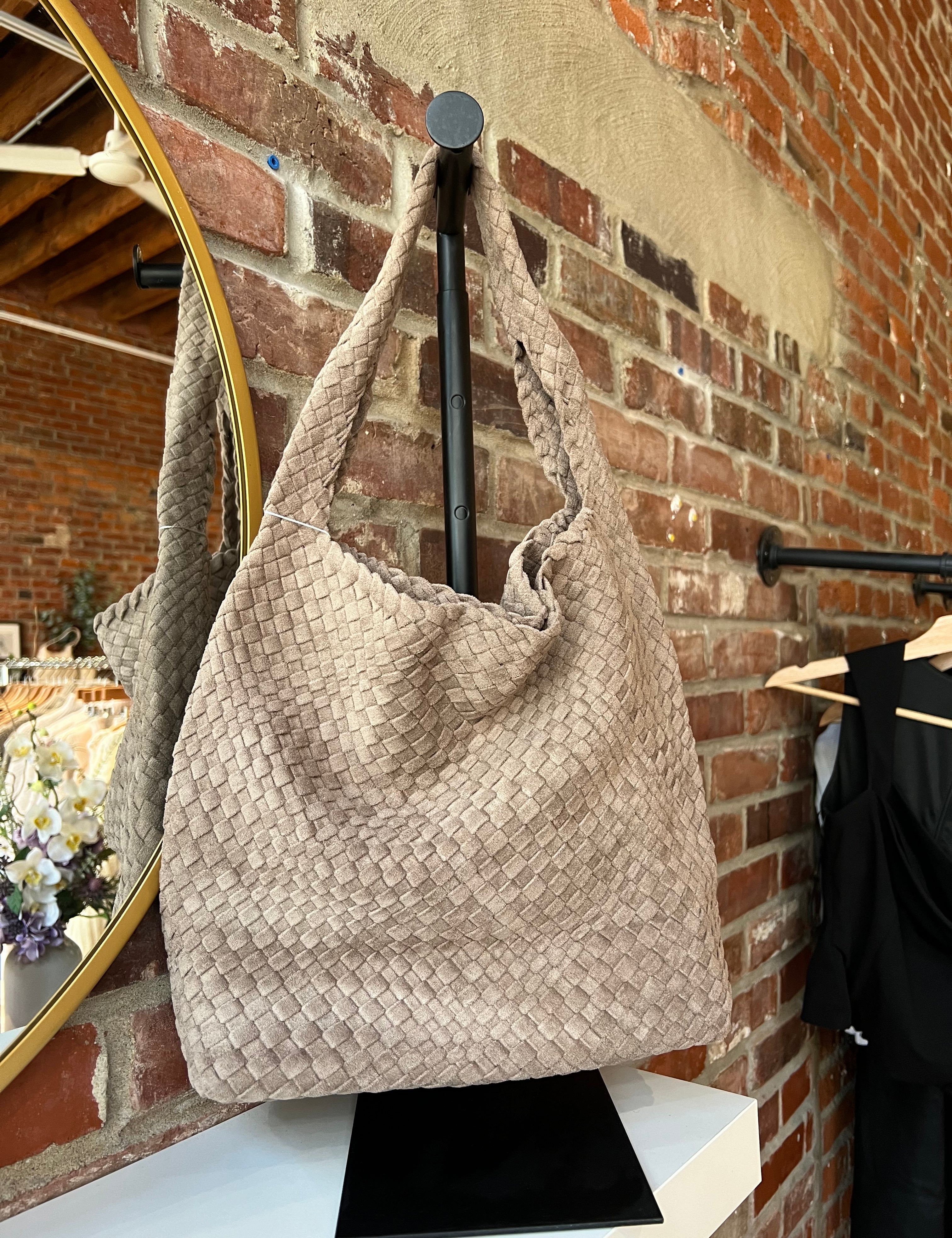Perry Suede Woven Shoulder Bag in textured taupe with soft suede weave and wide shoulder strap