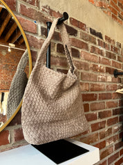 Perry Suede Woven Shoulder Bag in textured taupe with soft suede weave and wide shoulder strap