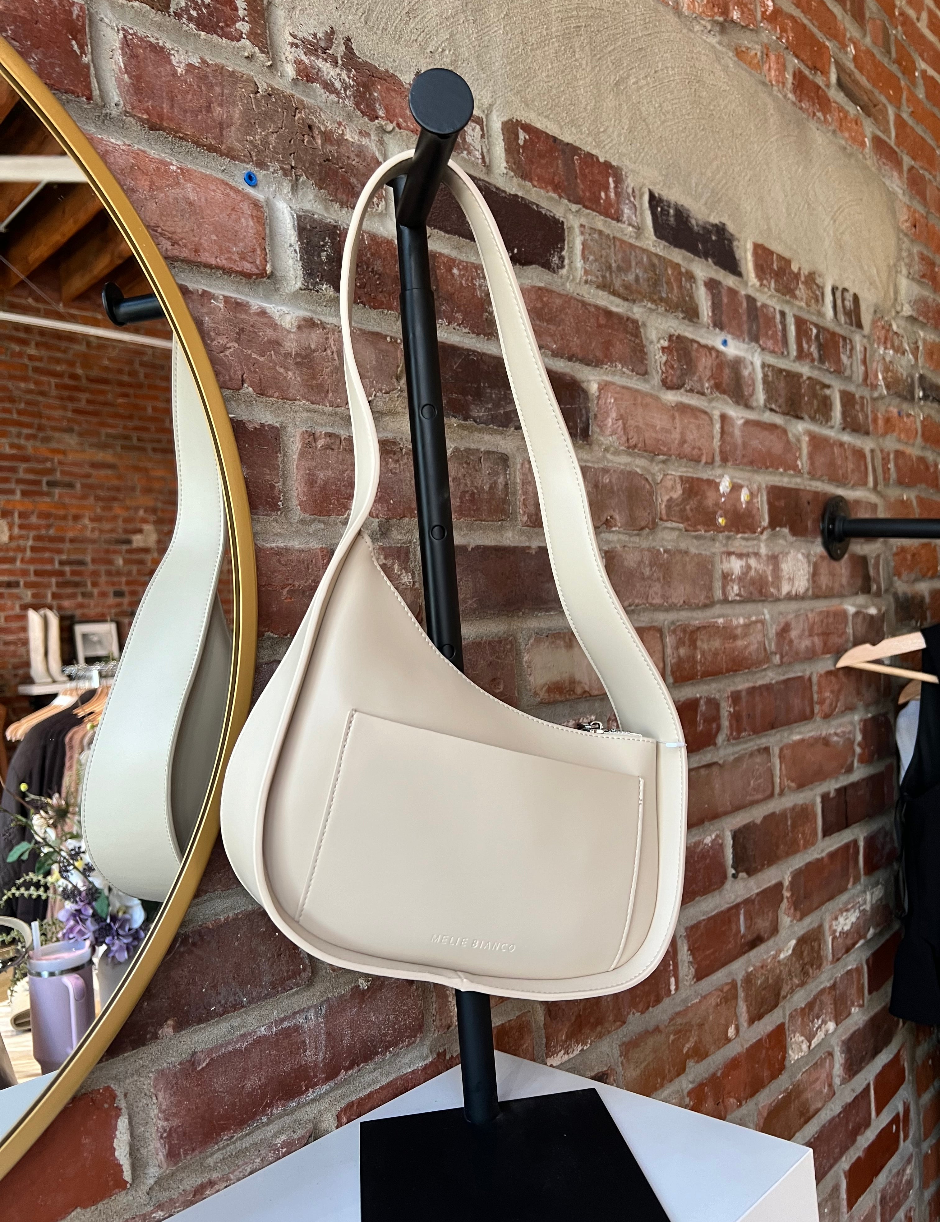 Reese Bone Leather Shoulder Bag with curved minimalist silhouette and sleek soft bone leather finish