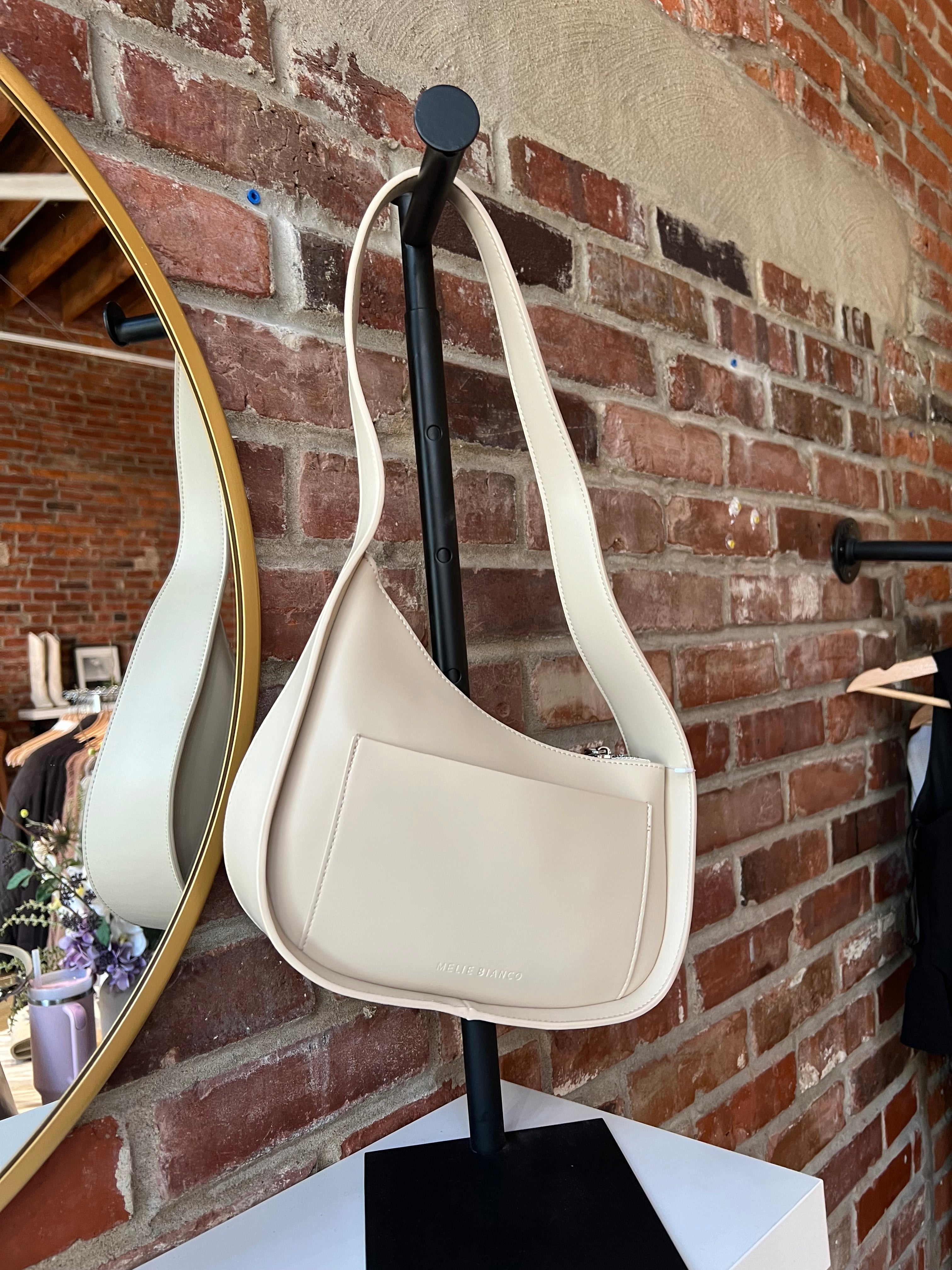 Reese Bone Leather Shoulder Bag with curved minimalist silhouette and sleek soft bone leather finish