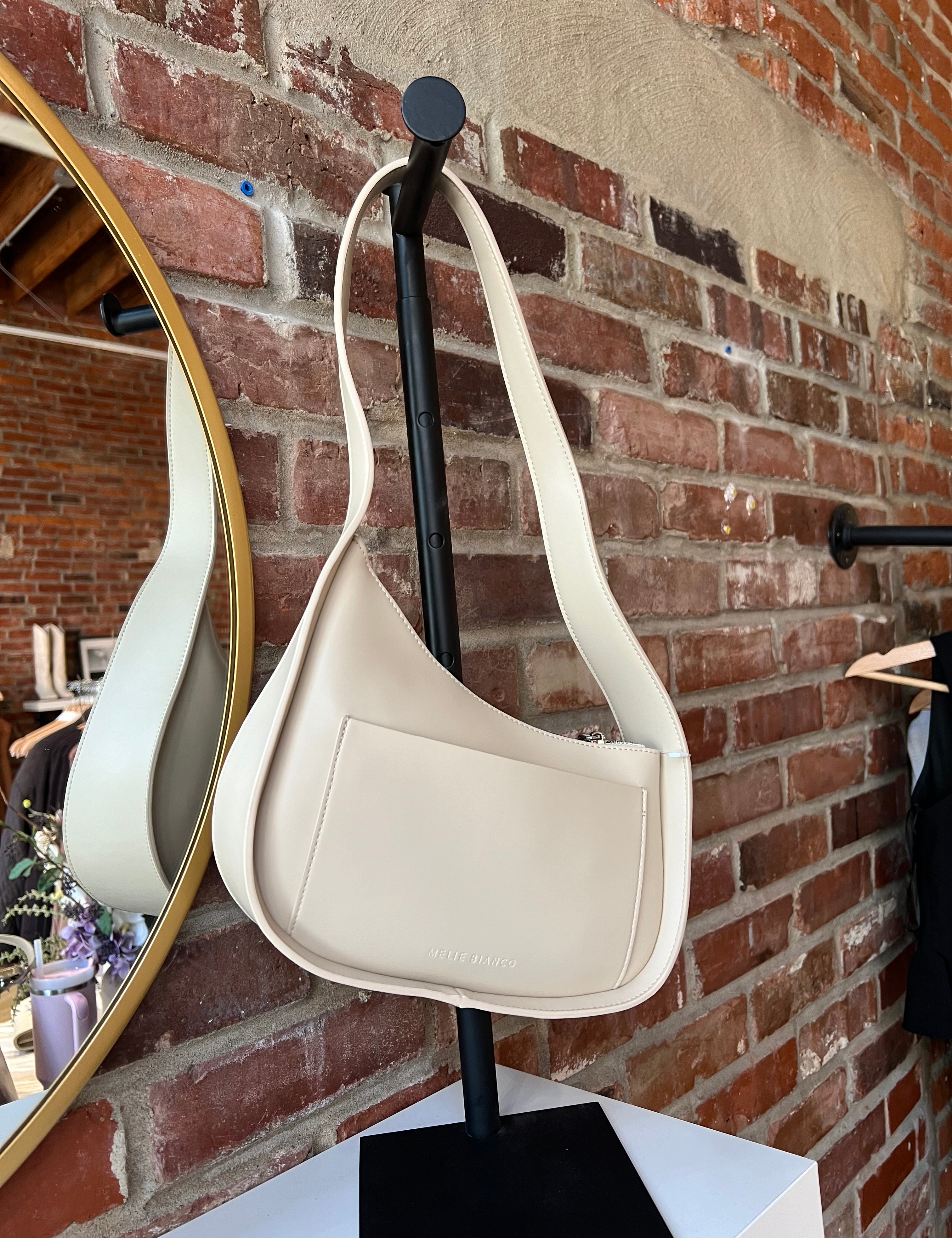 Reese Bone Leather Shoulder Bag with curved minimalist silhouette and sleek soft bone leather finish