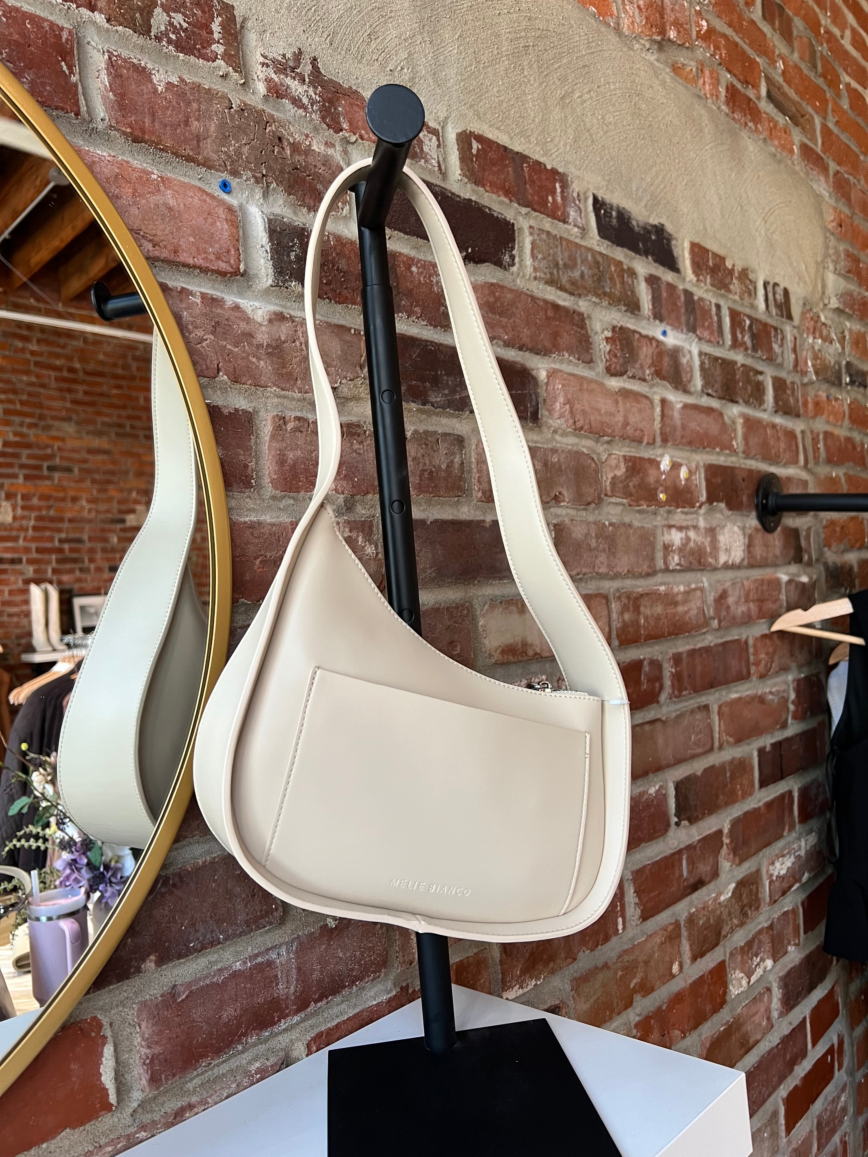 Reese Bone Leather Shoulder Bag with curved minimalist silhouette and sleek soft bone leather finish