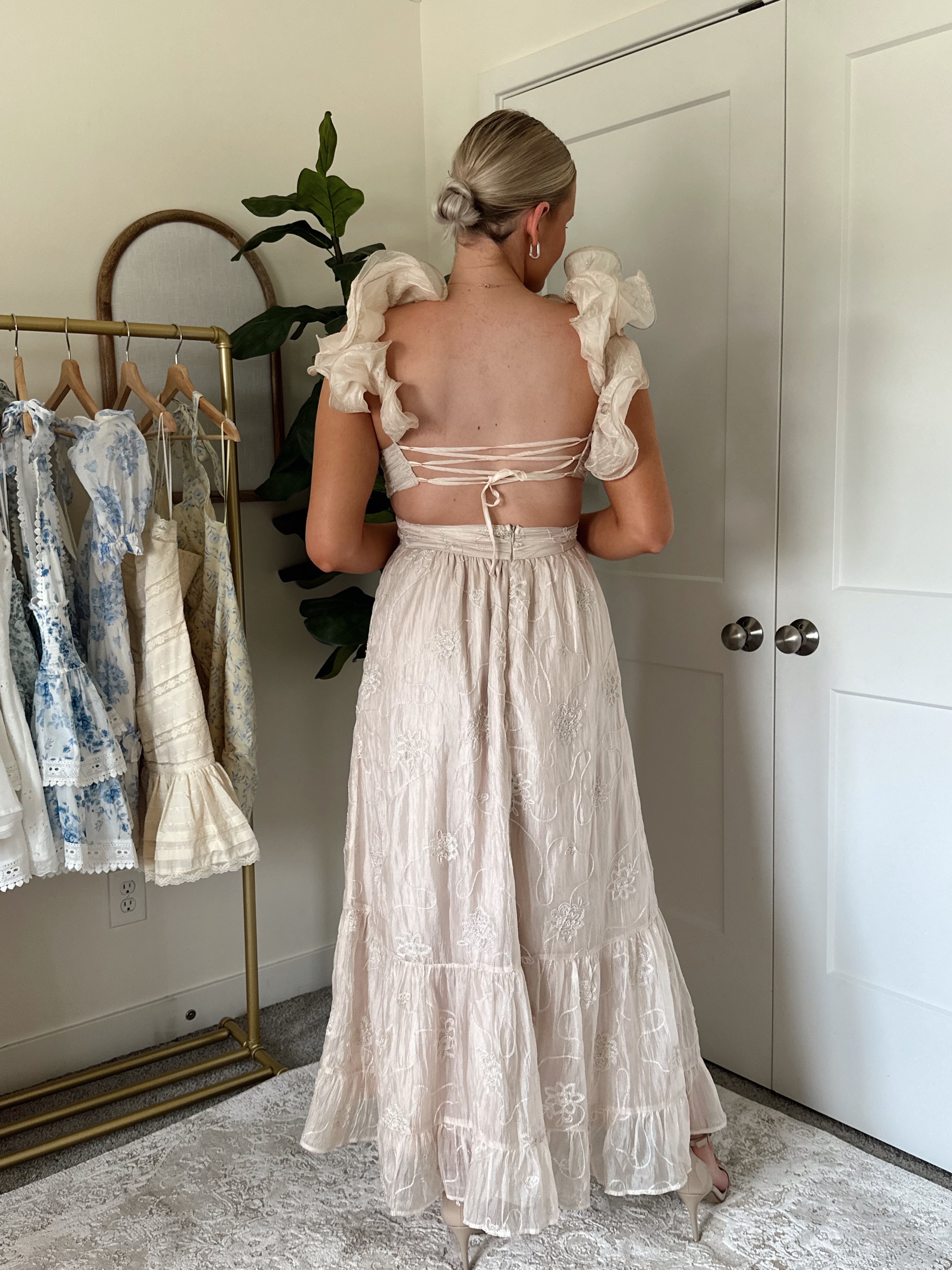 Champagne embroidered floral midi dress with ruffles, side cutouts, and lace-up open back