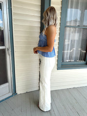 Blue and white striped tube top with elastic neckline and tie detail.