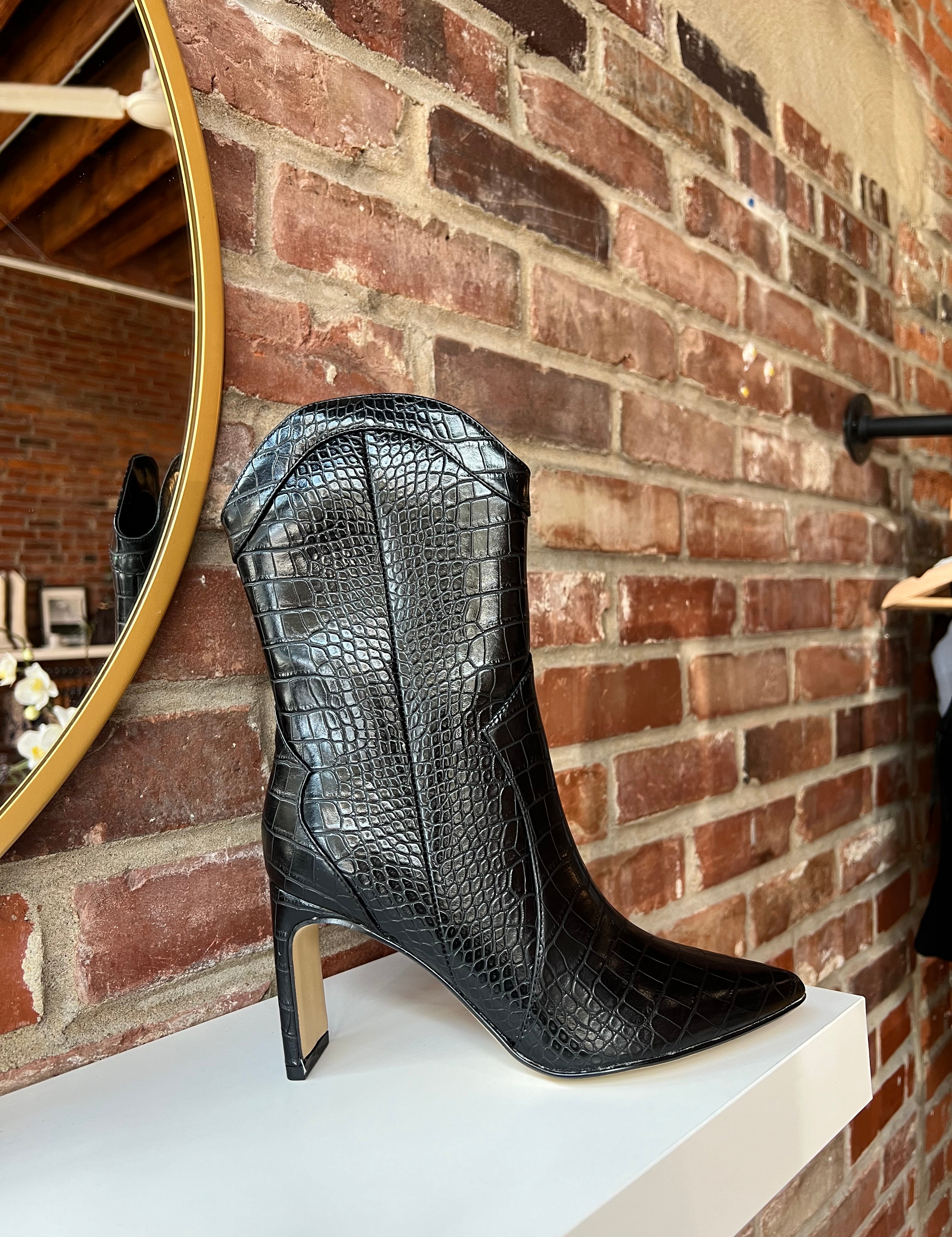 Black croc mid calf closed toed boot with zipper closure. 