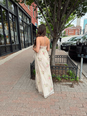 Strapless beige chiffon maxi dress with pink floral embroidery and leg slit