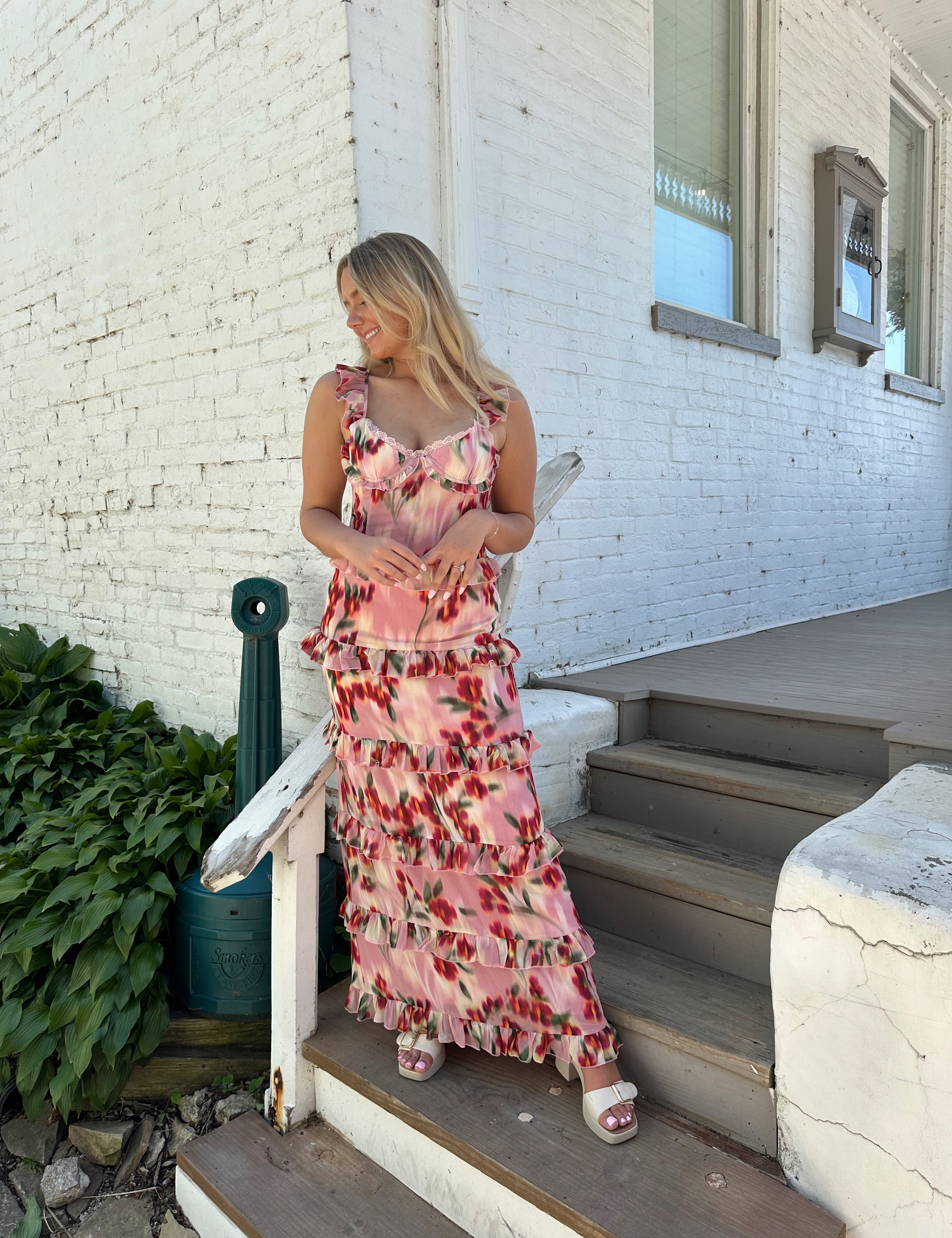 Pink floral tiered maxi dress with corset lace up back.