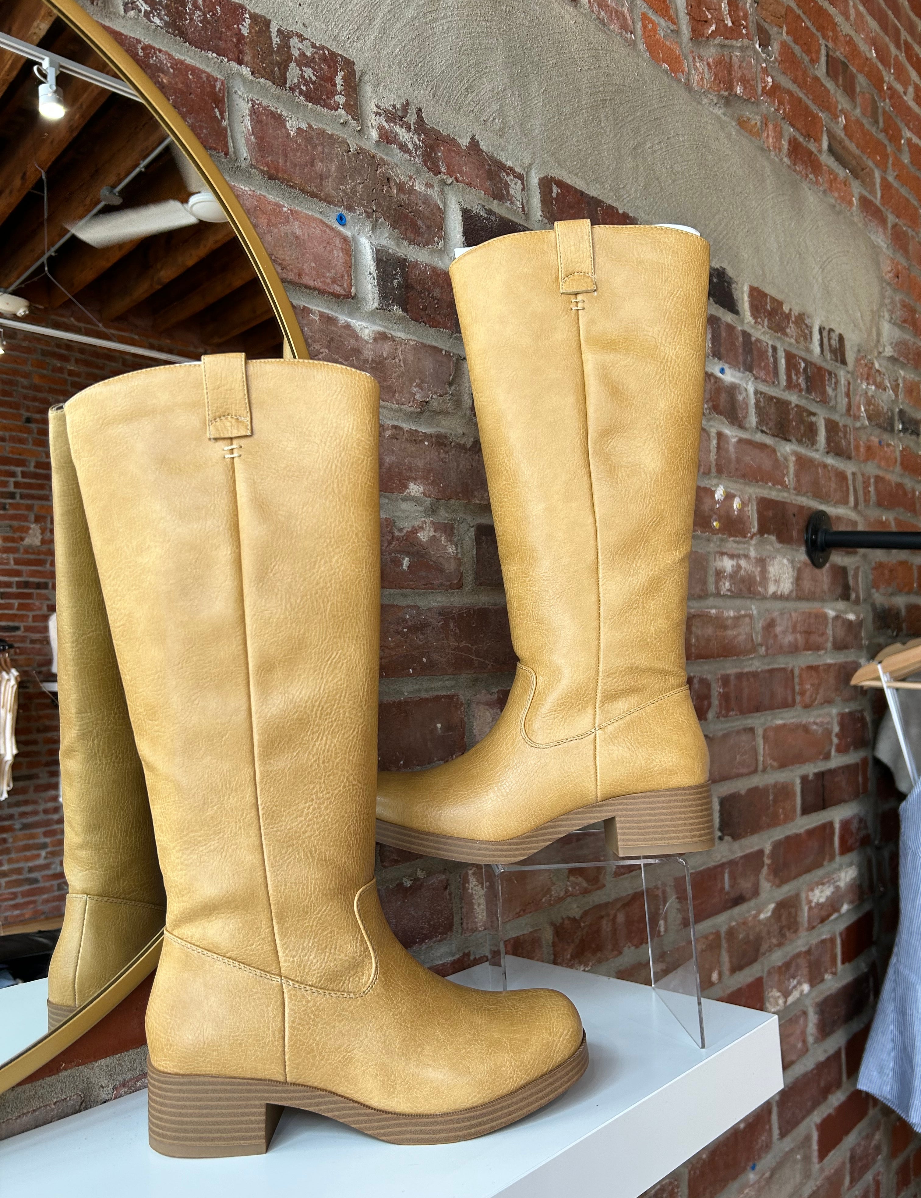 Camel colored vegan leather knee boot with block heel.