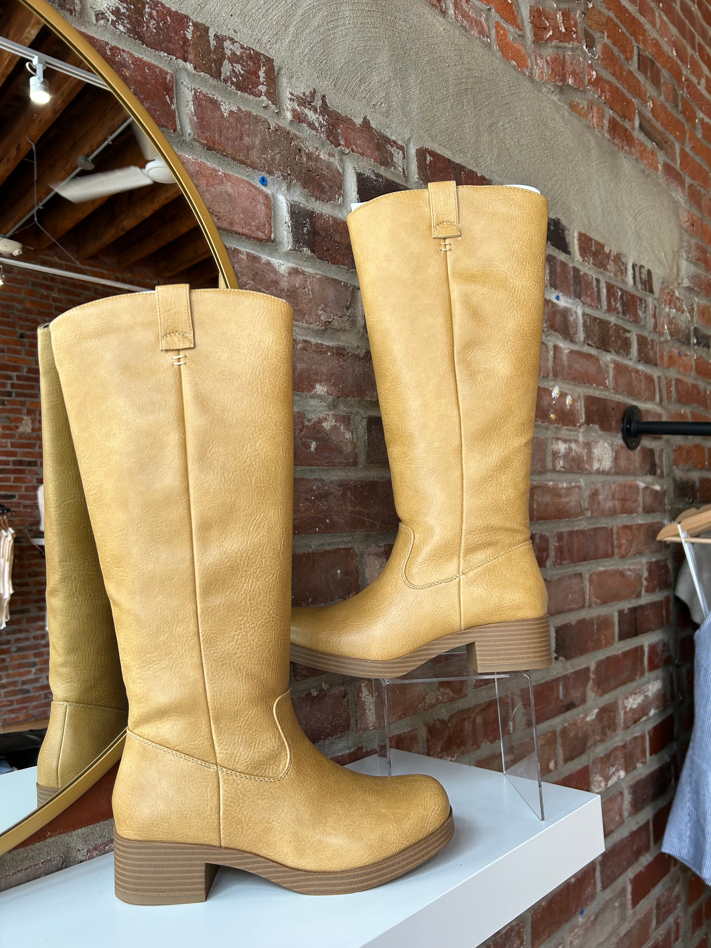 Camel colored vegan leather knee boot with block heel.