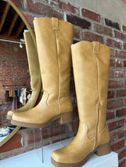 Camel colored vegan leather knee boot with block heel.