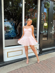 Light pink linen mini dress with iridescent beading detail.