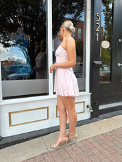 Light pink linen mini dress with iridescent beading detail.