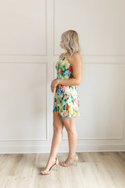 Satin floral halter mini dress with watercolor print and waist cutout