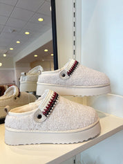 Ivory Slip On Sherpa Clogs.