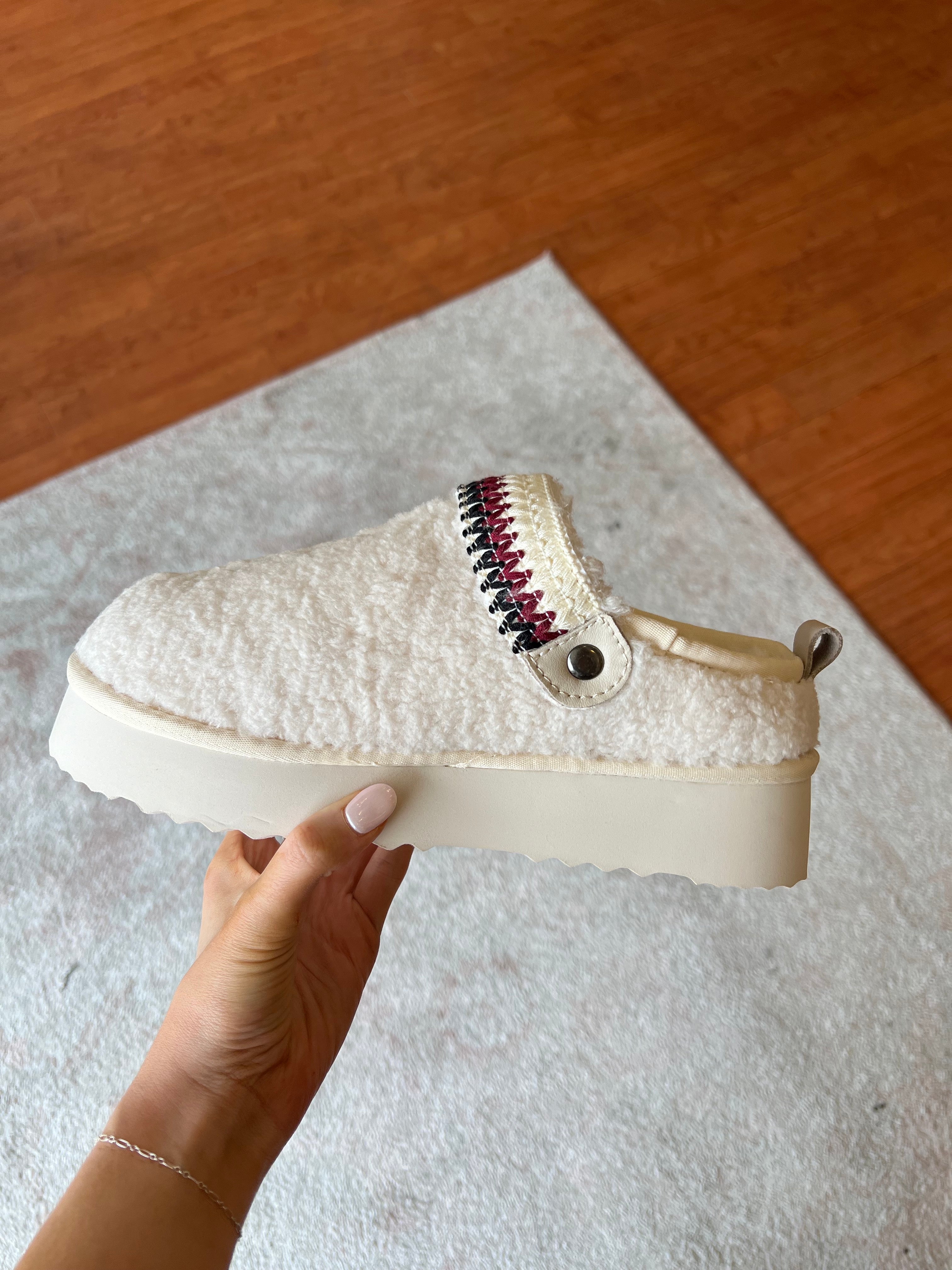 Ivory Slip On Sherpa Clogs.