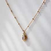 Raina Pebble Gold Plated Necklace.